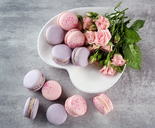 Tasty macaroons with roses