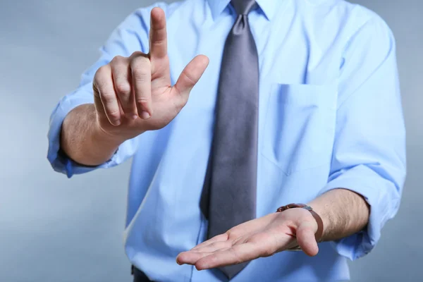 Male hands making sign