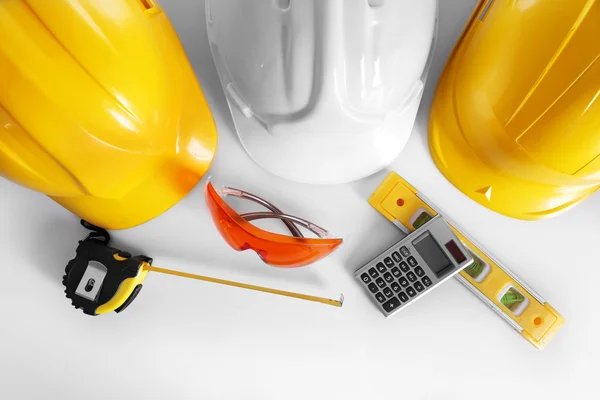 Construction tools and helmets