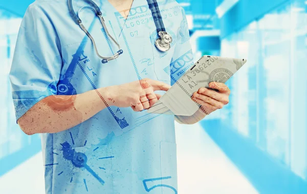 Doctor with tablet, double exposition