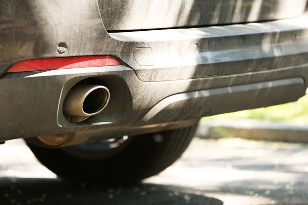 Exhaust pipe and back of car