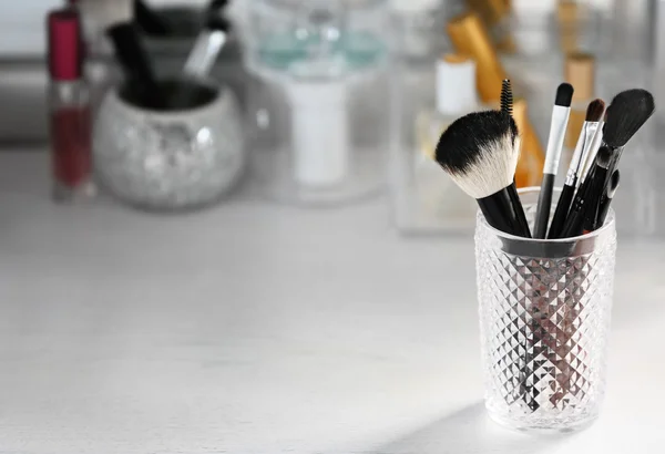 Cosmetic brushes in glass