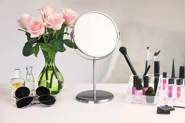 Cosmetic set on dressing table