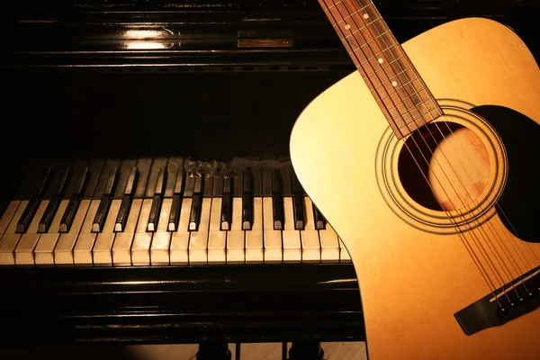 Guitar and piano, closeup