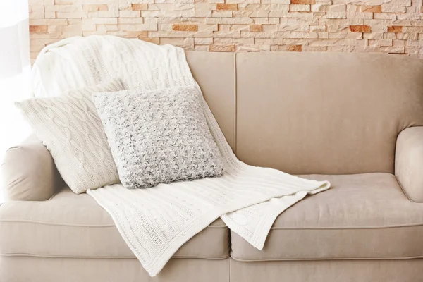 Stylish pillows on couch
