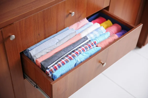 Folded clothes in drawer