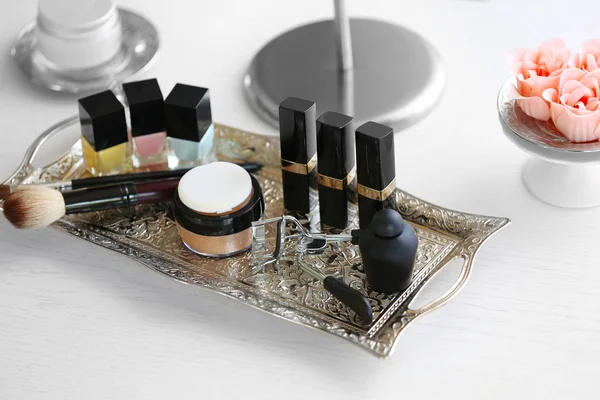 Cosmetic set on table
