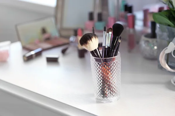 Cosmetic brushes in glass