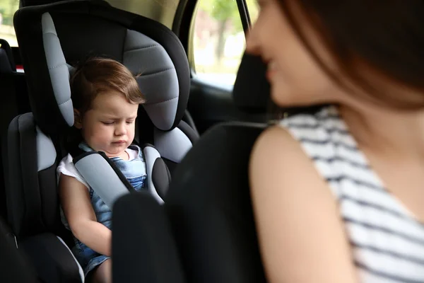 Mother and child in car