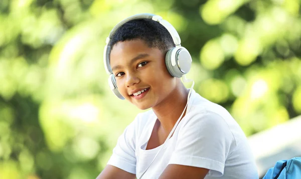 African American boy listening music