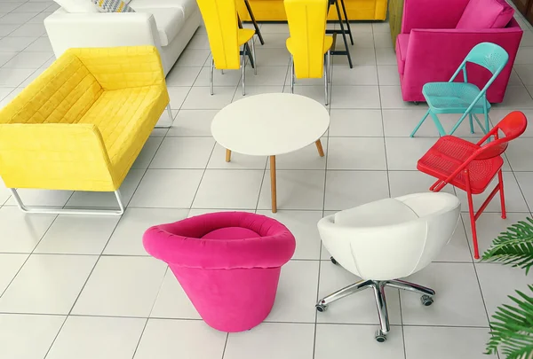 Stylish colorful furniture in interior