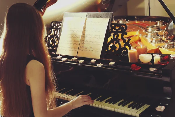 Girl playing piano