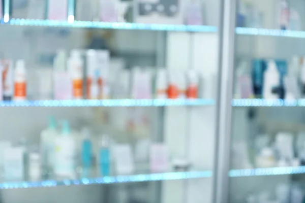 Beauty cosmetics on glass shelves