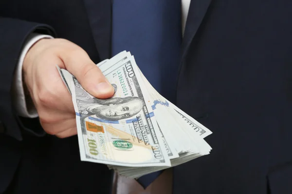 Businessman with money in hand
