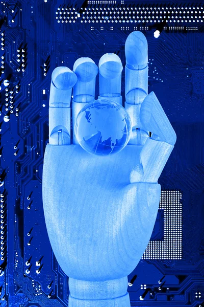 Robotic hand holding digital earth