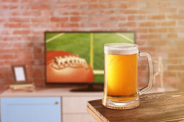 Beer in front of football