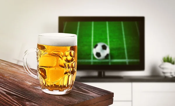 Beer in front of football