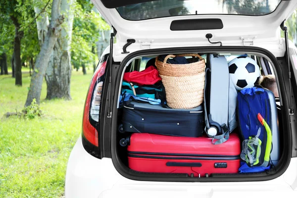 Car trunk full of bags