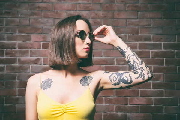 Beautiful woman with tattoo
