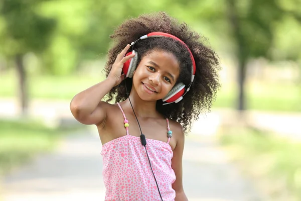 African American girl in headphones
