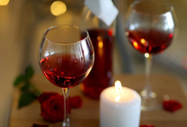Romantic composition with wine and candle