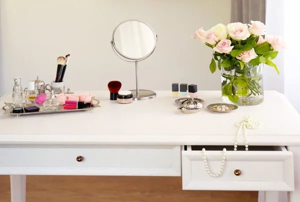 Dressing table with cosmetics