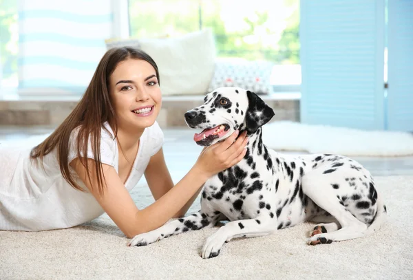 Owner with her dalmatian dog