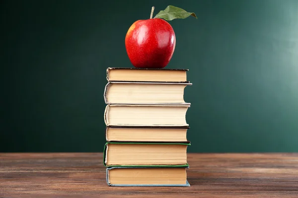 School books with apple
