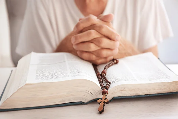 Old man reading the Bible