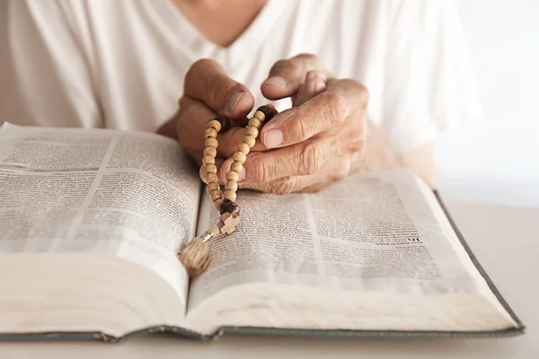 Old man reading the Bible