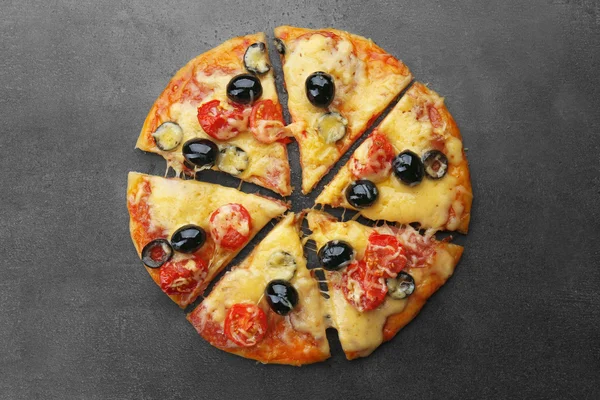 Sliced delicious pizza