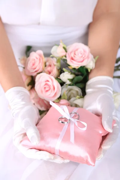 Bride in gloves on hands