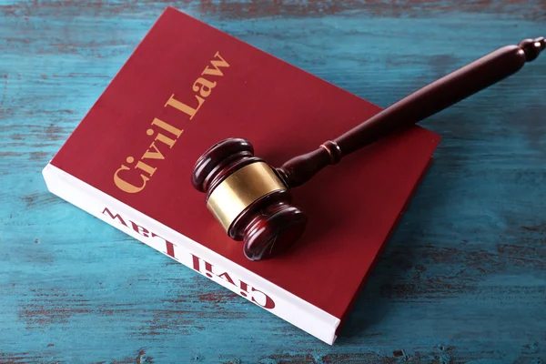 Civil Law book with hammer