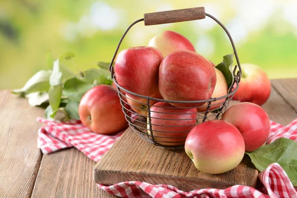 Sweet apples in wicker basket