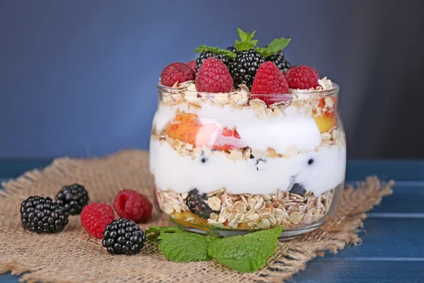 Yogurt with fresh fruit, berries and muesli