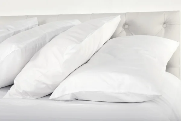 White pillows on bed