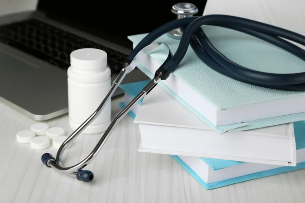 Medical stethoscope with books
