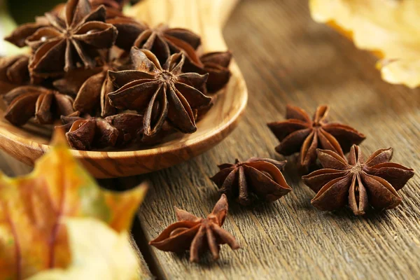 Stars anise in wooden spoon