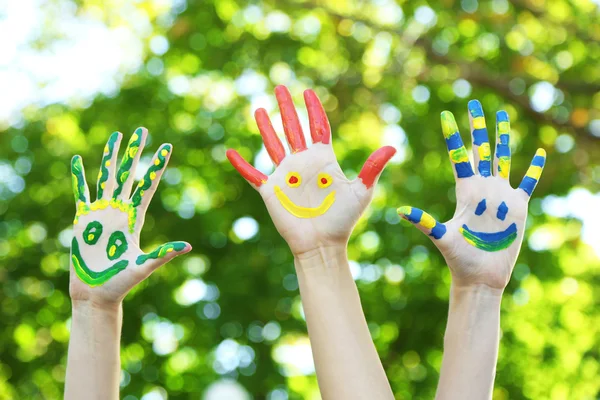 Smiling colorful hands
