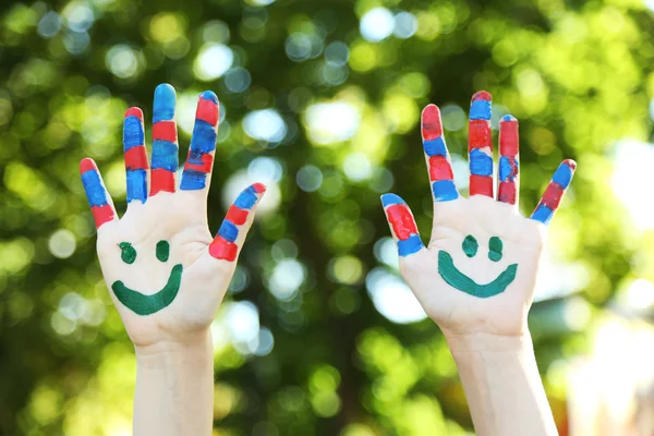 Smiling colorful hands