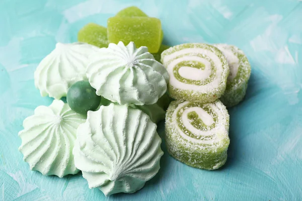 Mint color meringues and mint jelly candies