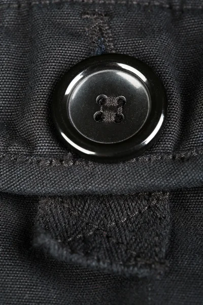 Button on black clothes