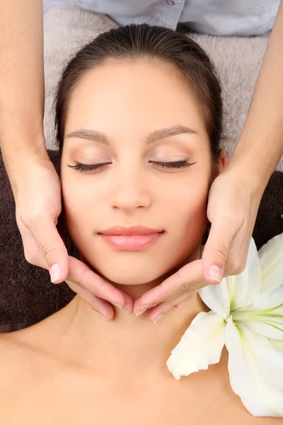 Woman taking head massage