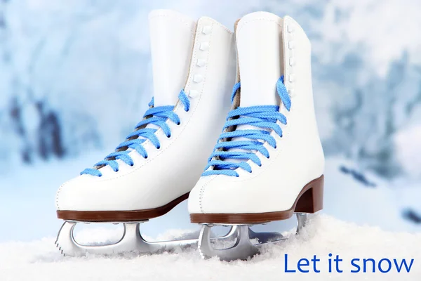 Let it snow greeting card with figure skates on it