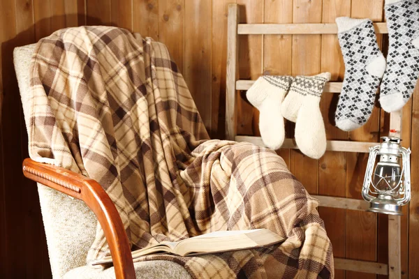 Rocking chair with plaid