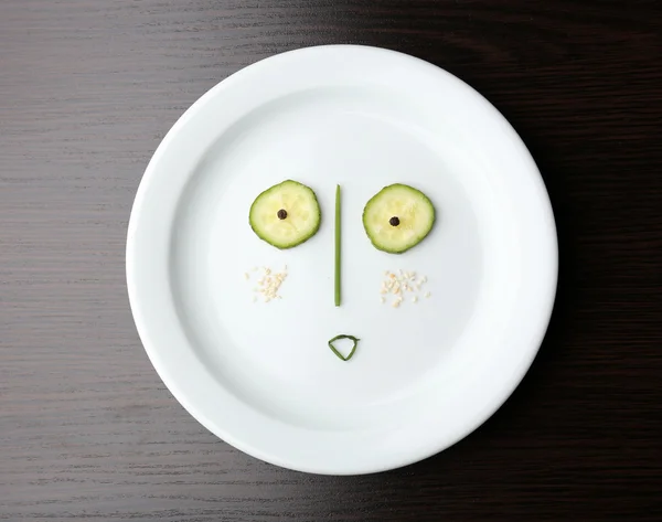Vegetable face on plate
