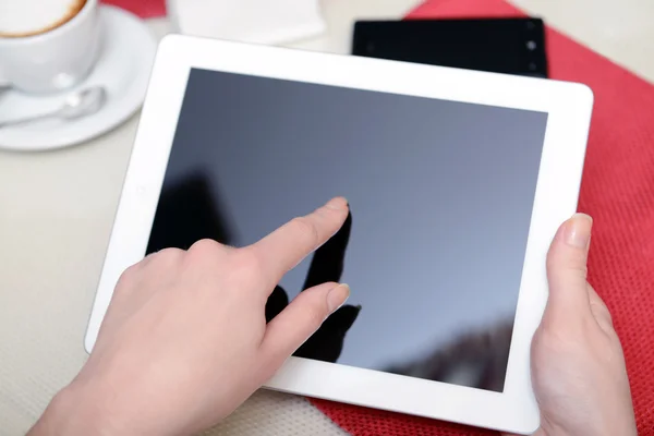 Woman with tablet computer