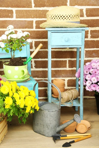 Flowers in pot on chair