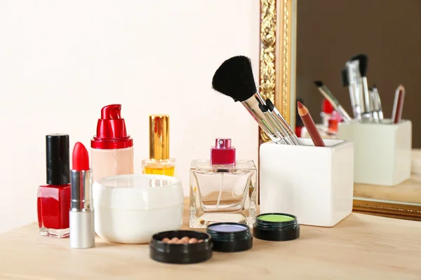 Different cosmetics on dressing table, close up