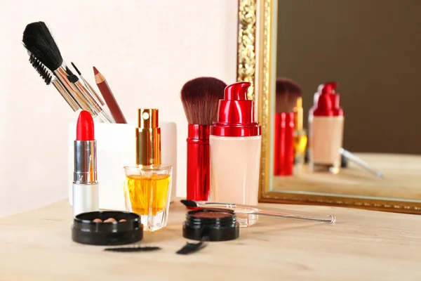 Different cosmetics on dressing table, close up